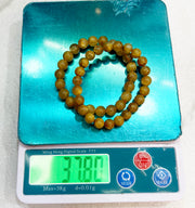 Bracelet of natural stone beads gold rutil quartz attracting stones