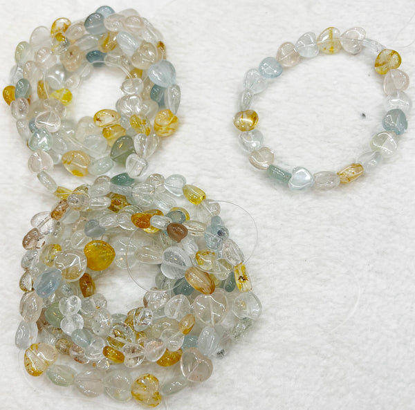 Bracelet of natural stone beads of natural topaz attracting stones