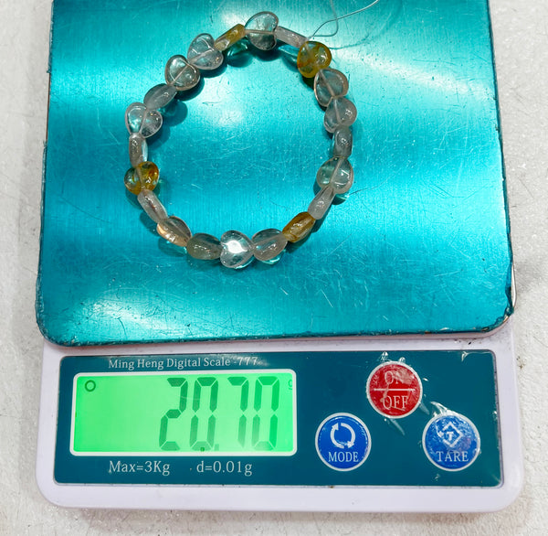 Bracelet of natural stone beads of natural topaz attracting stones