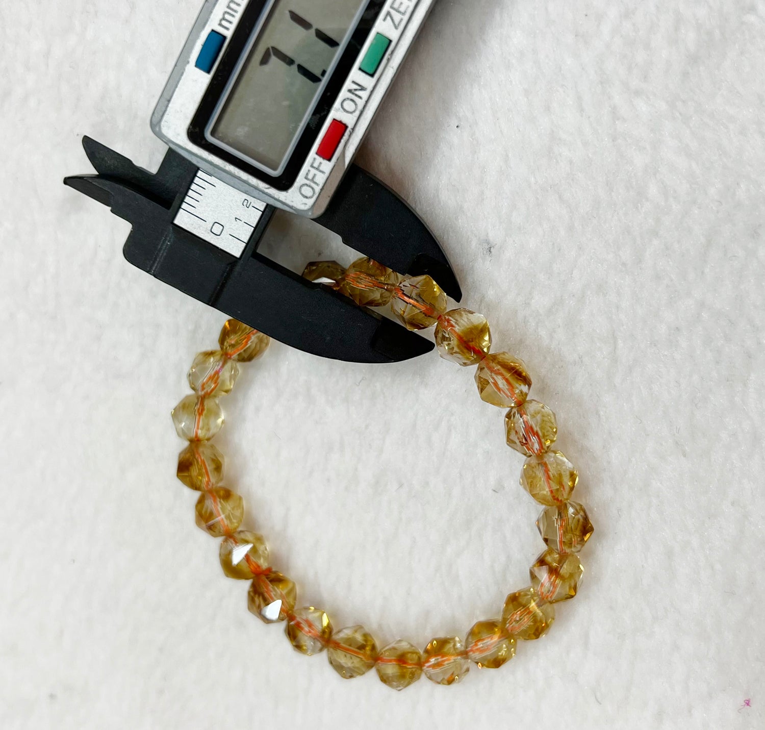 Bracelet of natural stone beads of yellow citrine attracting stones