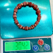 Armband aus Natursteinperlen aus Rhodachrosit, die Steine ​​anziehen