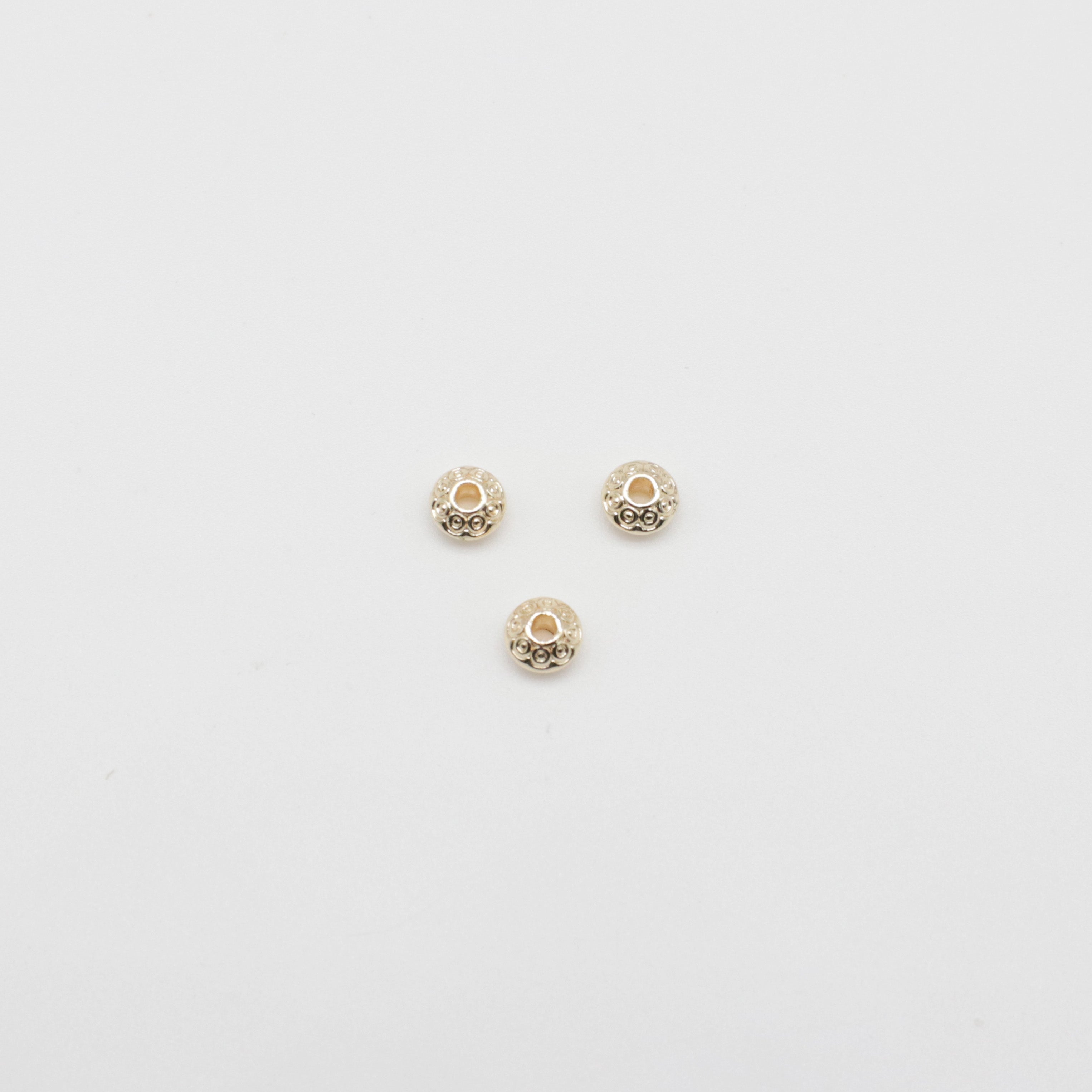 5,5 mm große Abucas-Perlen aus Messing mit Muster