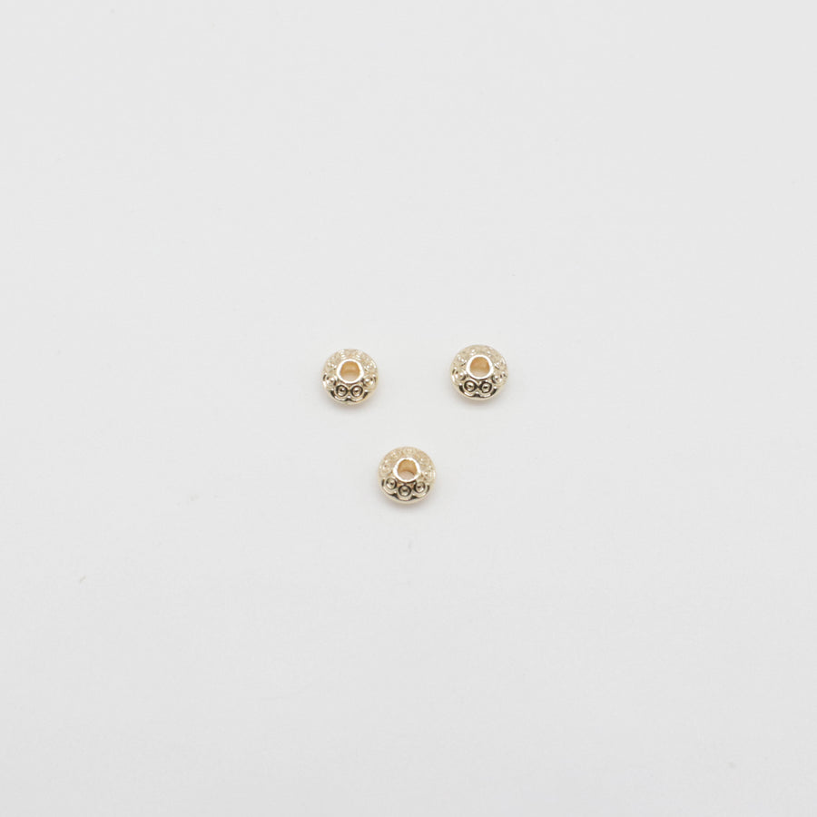 5,5 mm große Abucas-Perlen aus Messing mit Muster