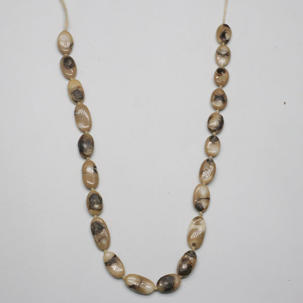 White Coral Strand In Olive Roundel Oval shape