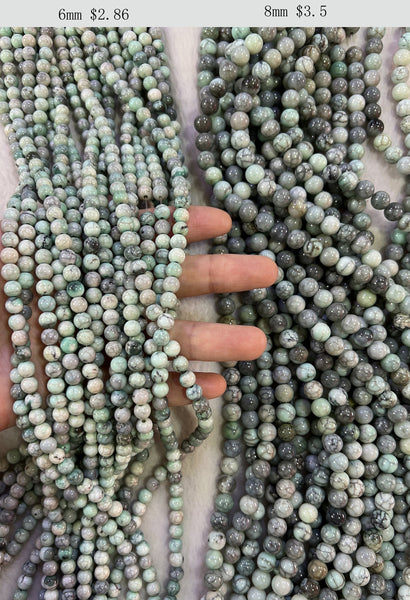 Fili di perle di agata crepa liscia
