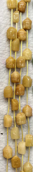 boudha in pietra naturale, perline di pietra incise