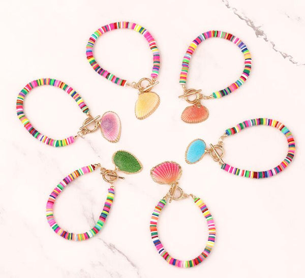 Joli bracelet cauri multicolore et polymère